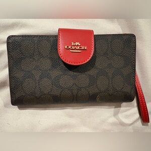 Coach Signature Phone Wallet in Brown and Red